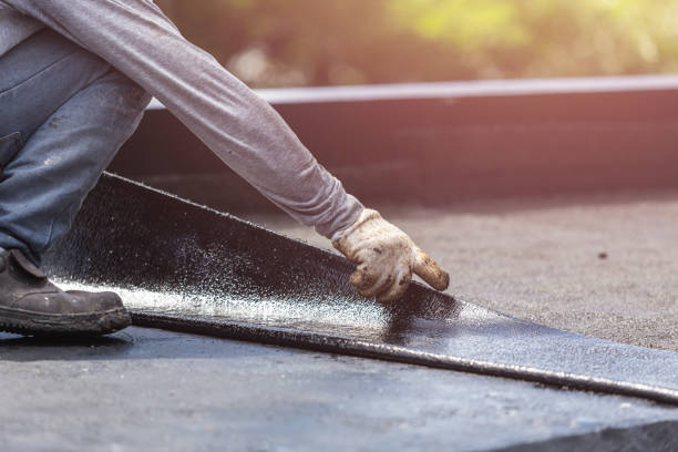 Professional Waterproofing technician working in Rio, VA